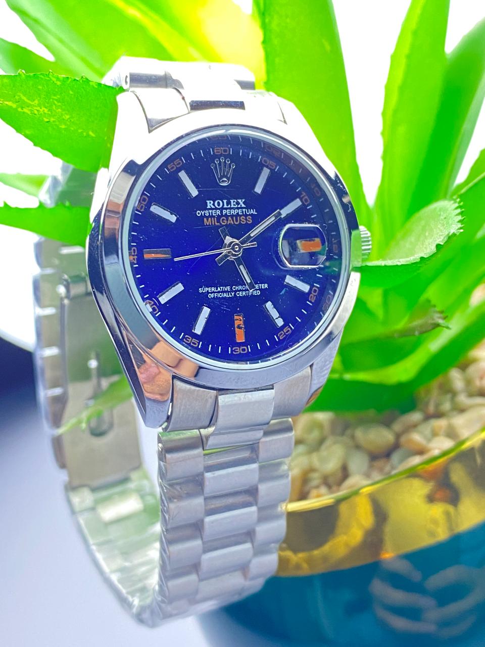 Sophisticated Edge: Silver Rolex with Blue Dial