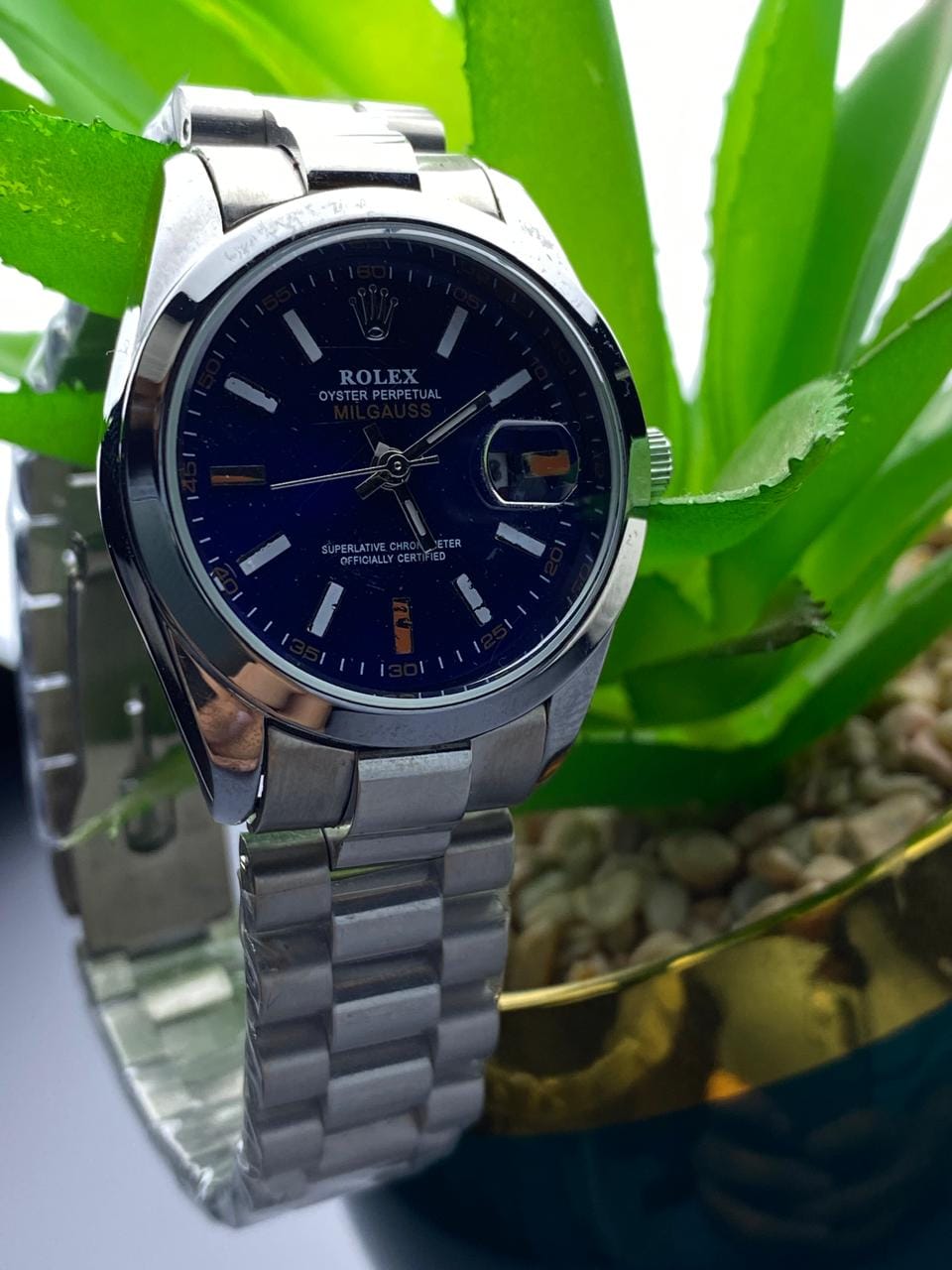Sophisticated Edge: Silver Rolex with Blue Dial - Image 4