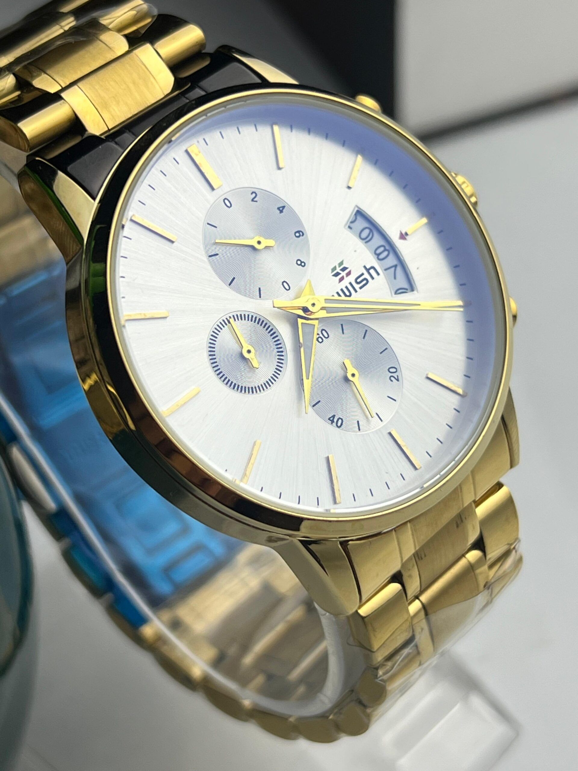 SWISH WATCH: Gold and Silver Sunburst Dial Chronograph for Him